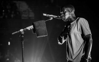 Daniel Caesar performing at Moody Theater